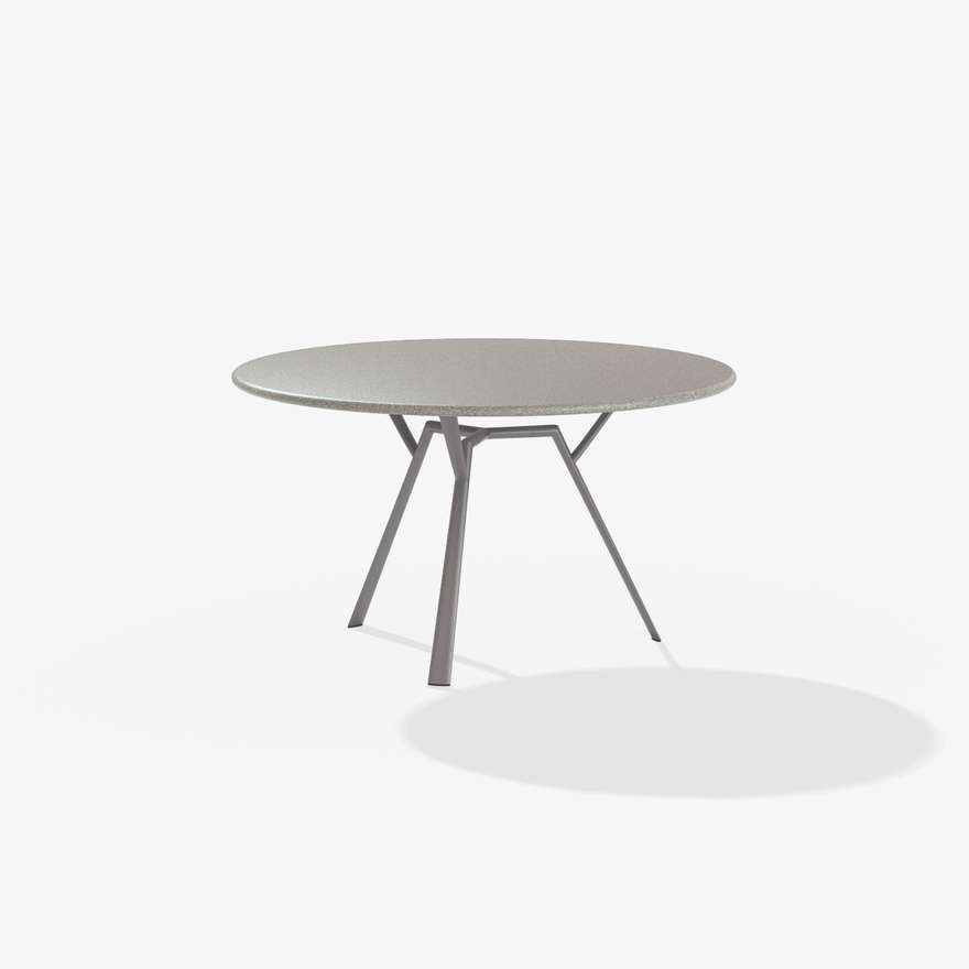 Radice Quadra | Tavolo tondo con piano in alluminio puntinato